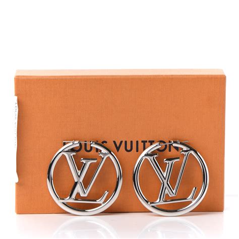 Louis Vuitton earrings v silver